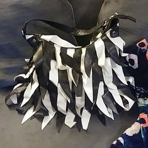 Black and white fringe purse